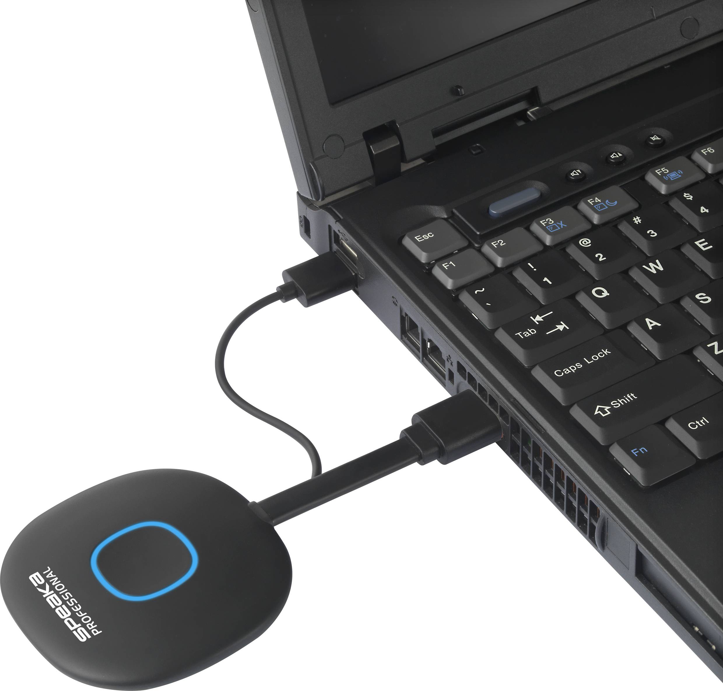 A black laptop with a Seagate Wireless Plus hard drive connected via a cable.