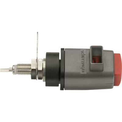 A grey, cylindrical electronic component with a red button, metal contact, and 'Schützinger' labelling on the side.