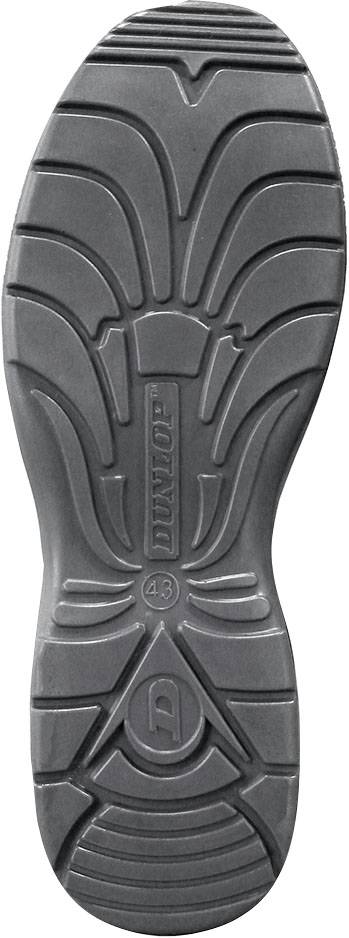 Sole of a boot with non-slip tread and brand name in the centre.