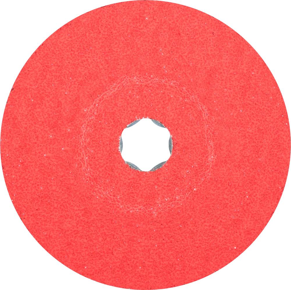 A red sandpaper disc with a hole in the centre.
