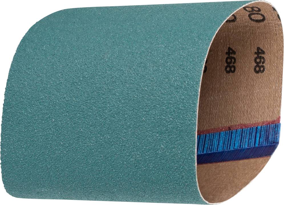A green abrasive belt, commonly used in grinding machines. It has a rough surface and is suitable for smoothing materials.