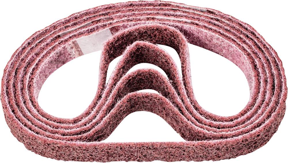 A red grinding belt, folded multiple times. It has a granular structure, indicating fine grinding work.