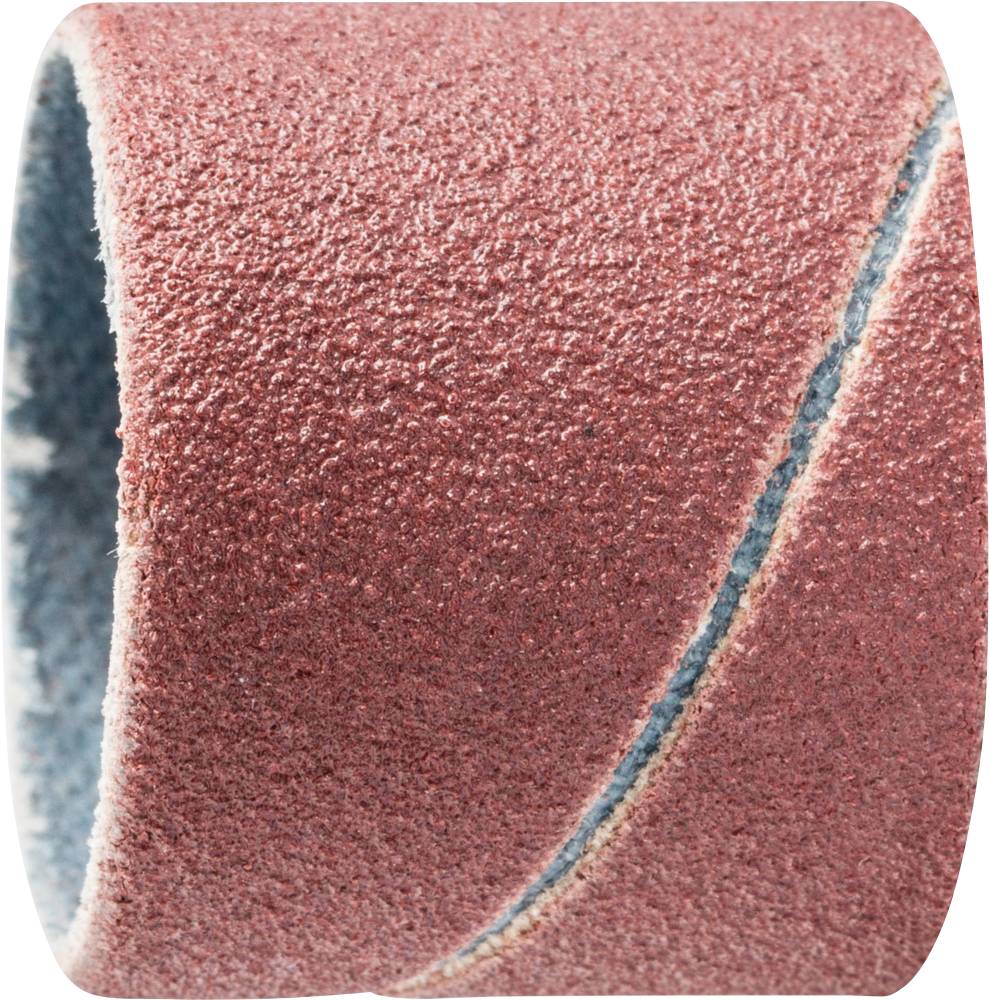 A roll of sandpaper with coarse grit, dyed red, shows a spiral winding. Used for sanding work on surfaces.