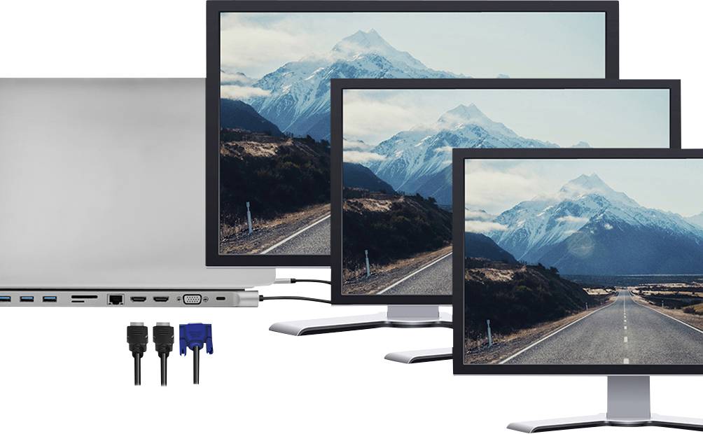 'Three monitors display a landscape image featuring mountains. Connections and cables for the monitors are visible in the foreground.'