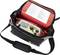 An open black bag reveals an electrical testing device with a digital display, surrounded by red compartments for accessories.
