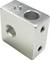 Metal block with multiple drillings, presumably part of a machine component or mechanical system.