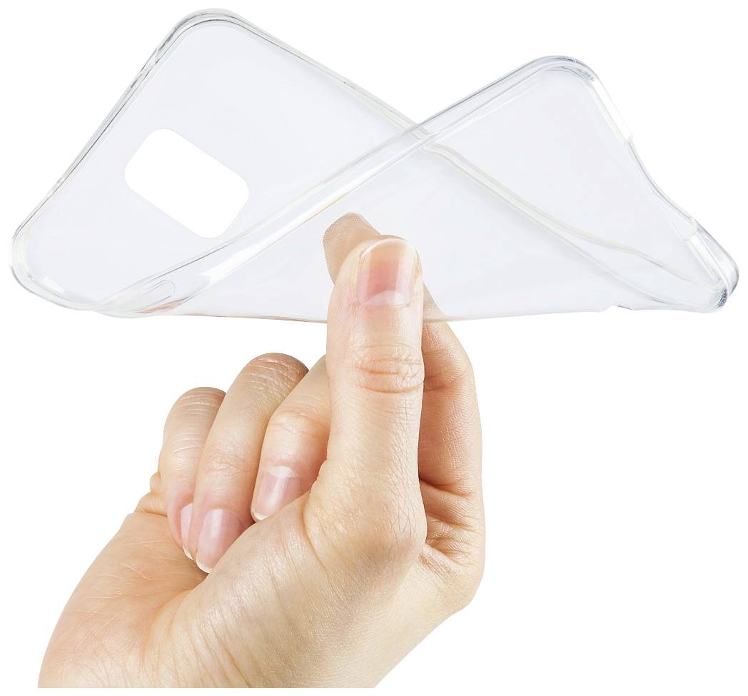 A hand is holding a transparent phone case in the air. The case is flexible and demonstrates its pliability.