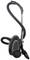 A black vacuum cleaner with a long suction hose and a telescopic tube stands upright with a nozzle on the floor.