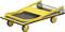Yellow trolley with four wheels and a folding handle. Used for moving heavy items across flat surfaces.