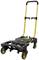 Sack truck with a yellow frame and black platform, four wheels, and an adjustable handle, suitable for transporting heavy loads.