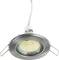 A round, metallic LED ceiling recessed light with numerous small, yellow illumination points and two spring clips on the sides.