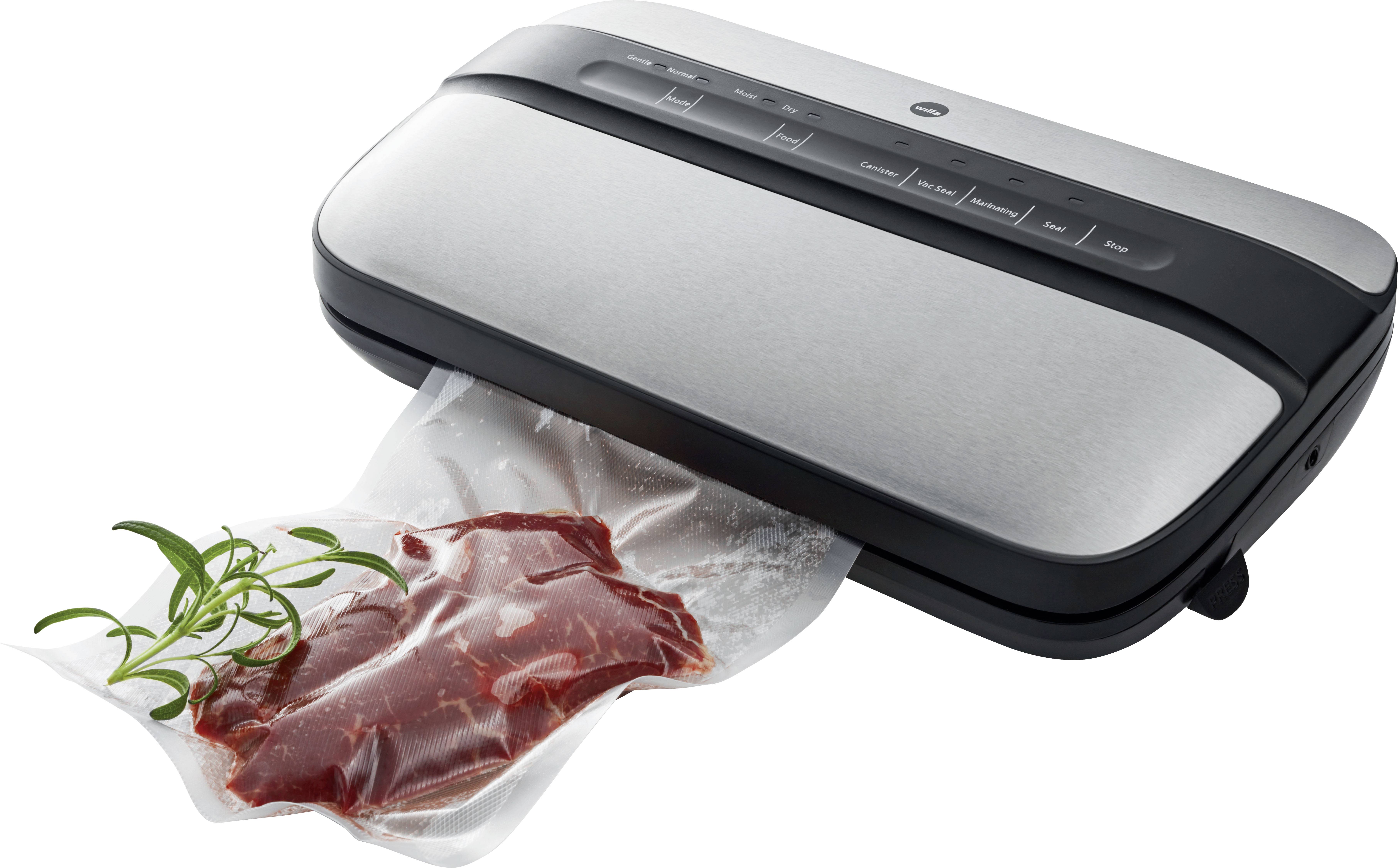 A vacuum sealer seals a bag containing fresh meat and herbs to extend shelf life and keep food fresh.