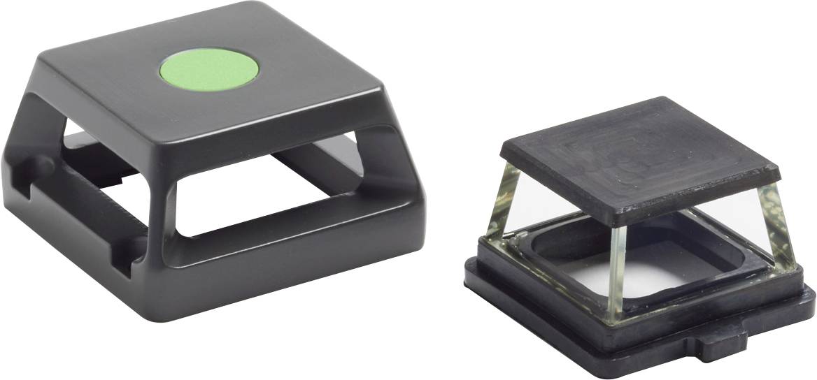 'Two square plastic covers: one with a green circle on top, the other removed, shows the internal structure.'