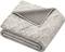 Soft grey flannel throw blanket with a crumpled texture.