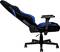 A black office chair with blue accents, in a reclined position, demonstrates adjustability and comfort for ergonomic seating.