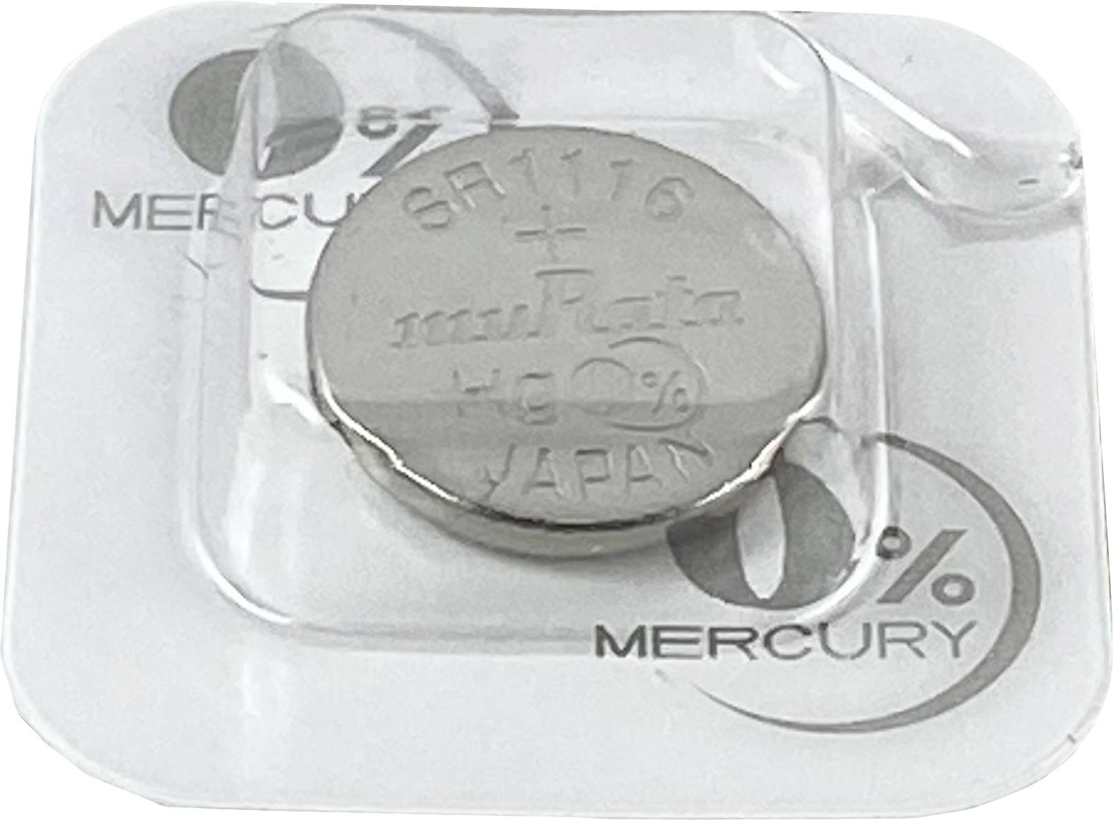 Silver button cell battery with inscription 'SR1116 muRata Hg 0% JAPAN' in blister packaging, note '0% Mercury'.