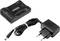 A black multi-socket adaptor with several socket outlets and a separate power supply with a European plug.