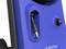 Close-up of a blue Nilfisk device with a black connection piece and a power button located next to it.