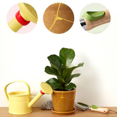 A yellow watering can, a brown plant pot with a green plant and gardening equipment. Image shows details such as water drainage, pot texture, and leaves.