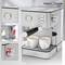 Stainless steel espresso machine with two filled cups, pressure gauge and steam wand. Shows water reservoir and button in detail.