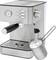 A silver espresso machine with a pressure gauge, three buttons, and a steam wand. A metal jug is frothing milk.