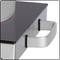 A silver square handle is attached to the side of a smooth, black glass-ceramic hob.