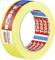 Yellow masking tape by tesa for precise painting work, on a roll with red 'tesa' markings.