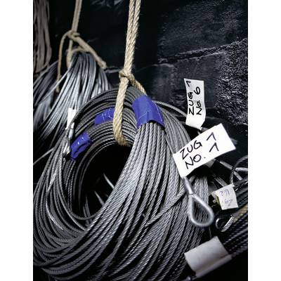 Steel cables hang in loops on a wall. Each cable has a label with the inscription 'Train 7 No. 6' and 'Train 7 No. 7'.