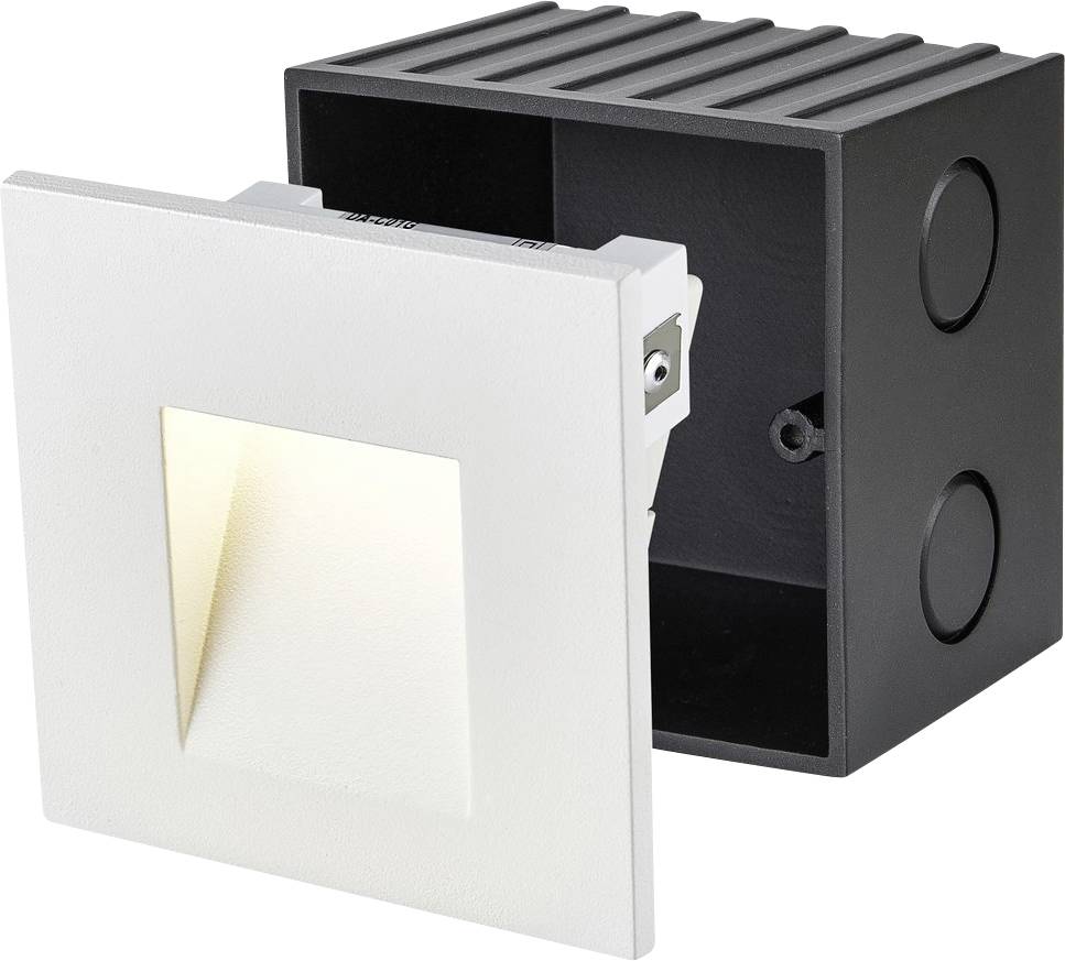 White LED wall light with angular design. Angled front section for directed lighting. Black open background. Ideal for interior spaces.