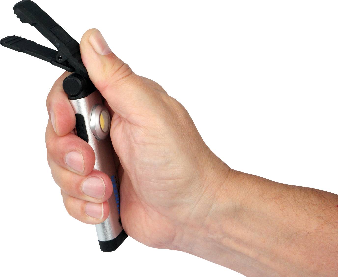 A hand is holding a small device with two black clamps, which appears to be an electronic tool or gadget.
