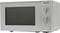 A white microwave with two rotary knobs on the right side for adjusting power and time.