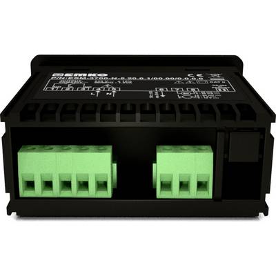 A black electronic device with green connection terminals. Technical specifications and circuit symbols are visible at the top.