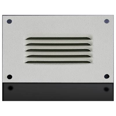 A rectangular metal ventilation grille with five horizontal slots, mounted on a smooth, light grey surface.