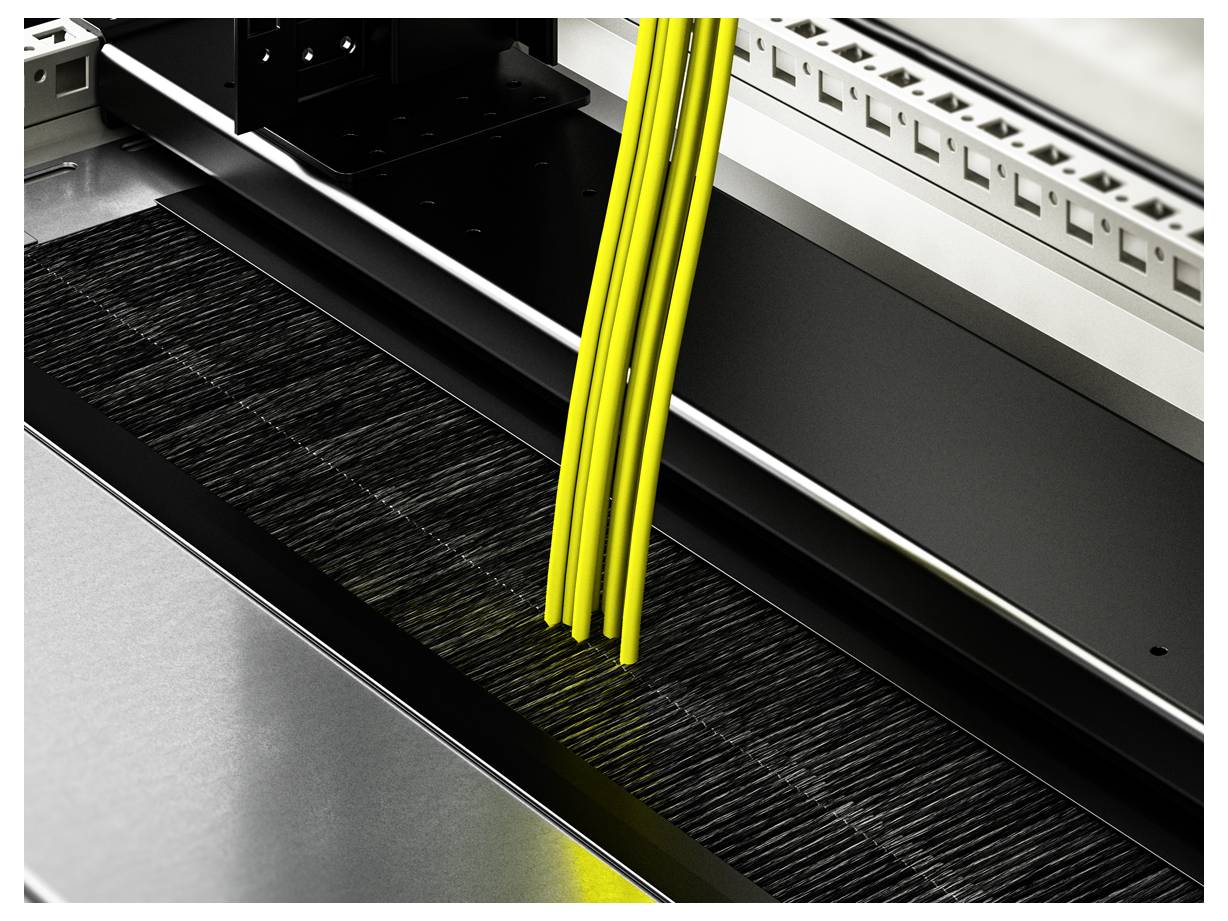 Yellow cables are routed through a cable gland in a server enclosure to ensure tidy cable management and connection.