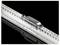 Metal rail with a sliding silver clamp on a black background. The clamp holds the two parts of the rail together.