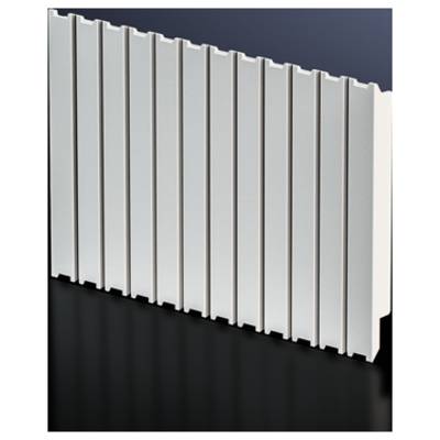 A white radiator with vertical fins against a dark grey background.