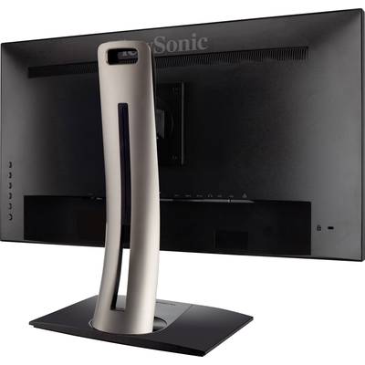 A computer monitor from a side rear view with a distinctive, curved metal stand and black casing.