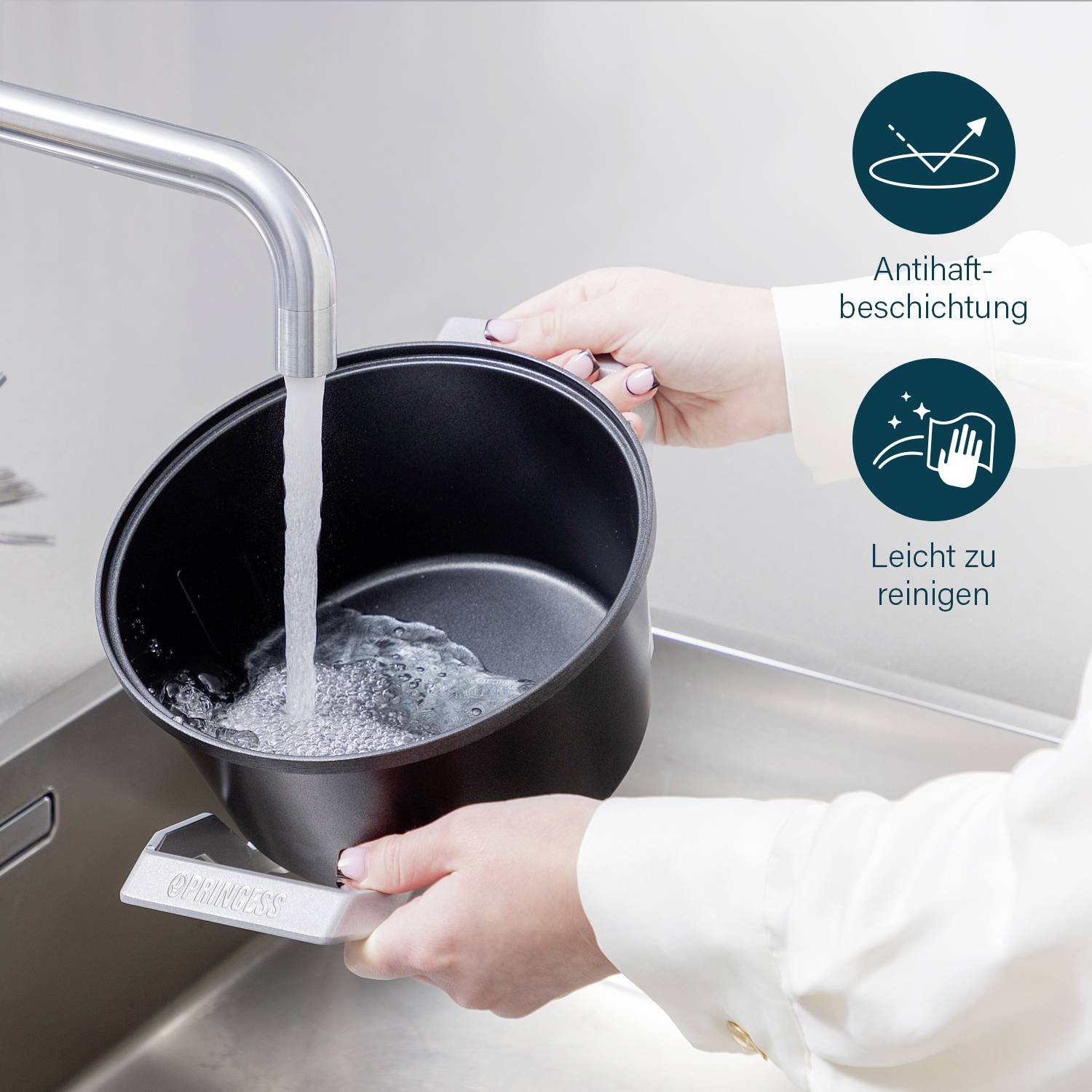 A person is rinsing a pan under running water. Text in image: 'Non-stick coating', 'Easy to clean'.