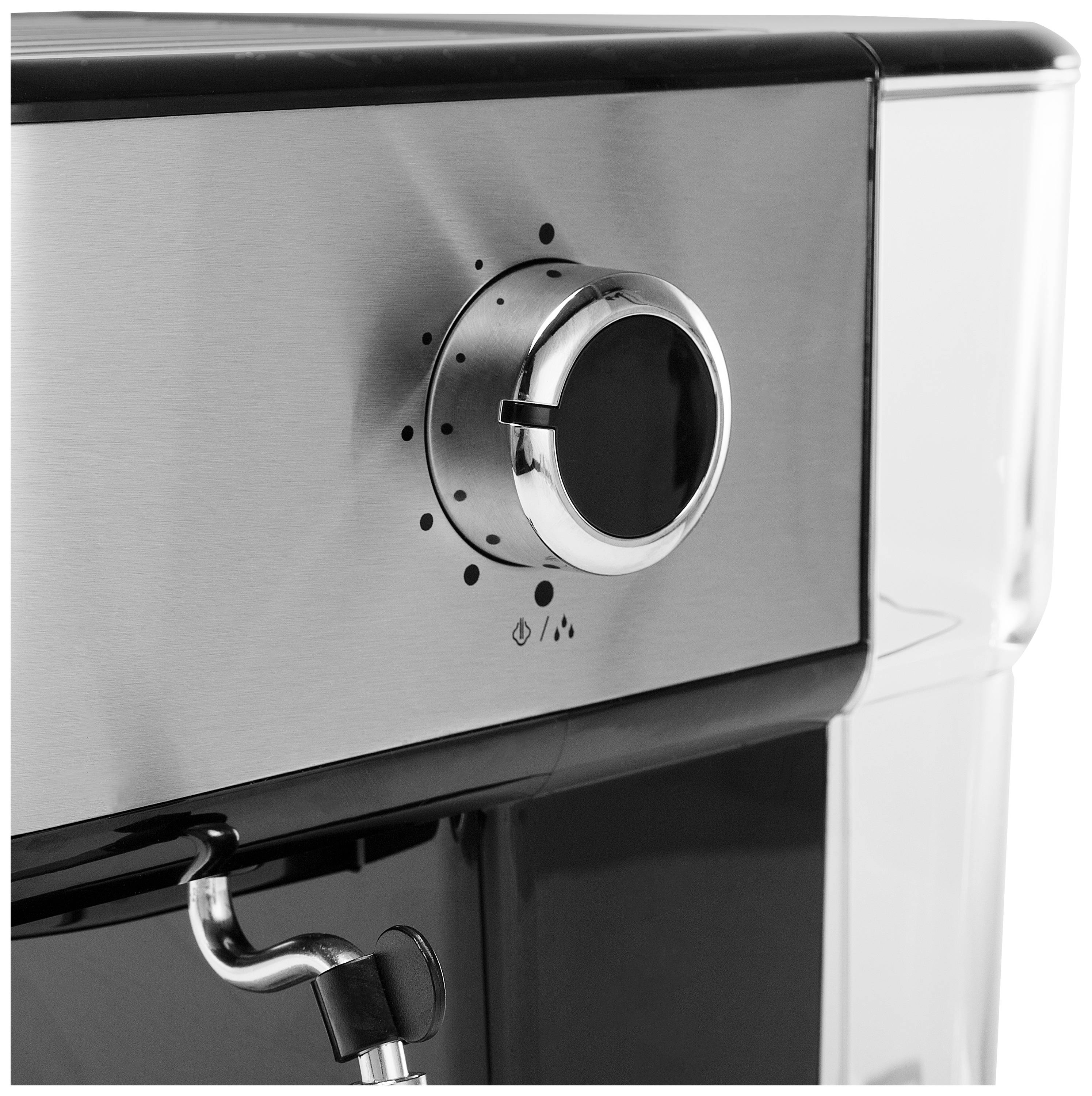 Close-up of a rotary knob on a silver kitchen appliance, likely a coffee machine, with a minimalist design.