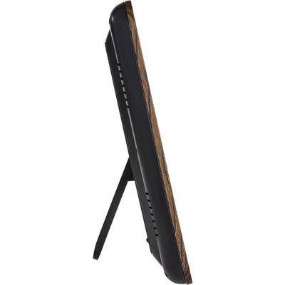 Digital photo frame made of black plastic with a wood grain effect on the side. It stands on a foldout stand.