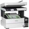A multifunction printer with a scanner, scanning a document. The display shows printer options.