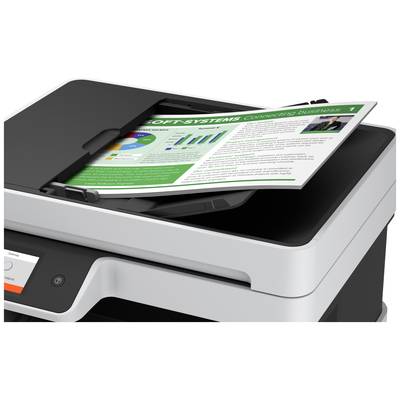 A printer is outputting a coloured document with diagrams and text in English. The document highlights business data.