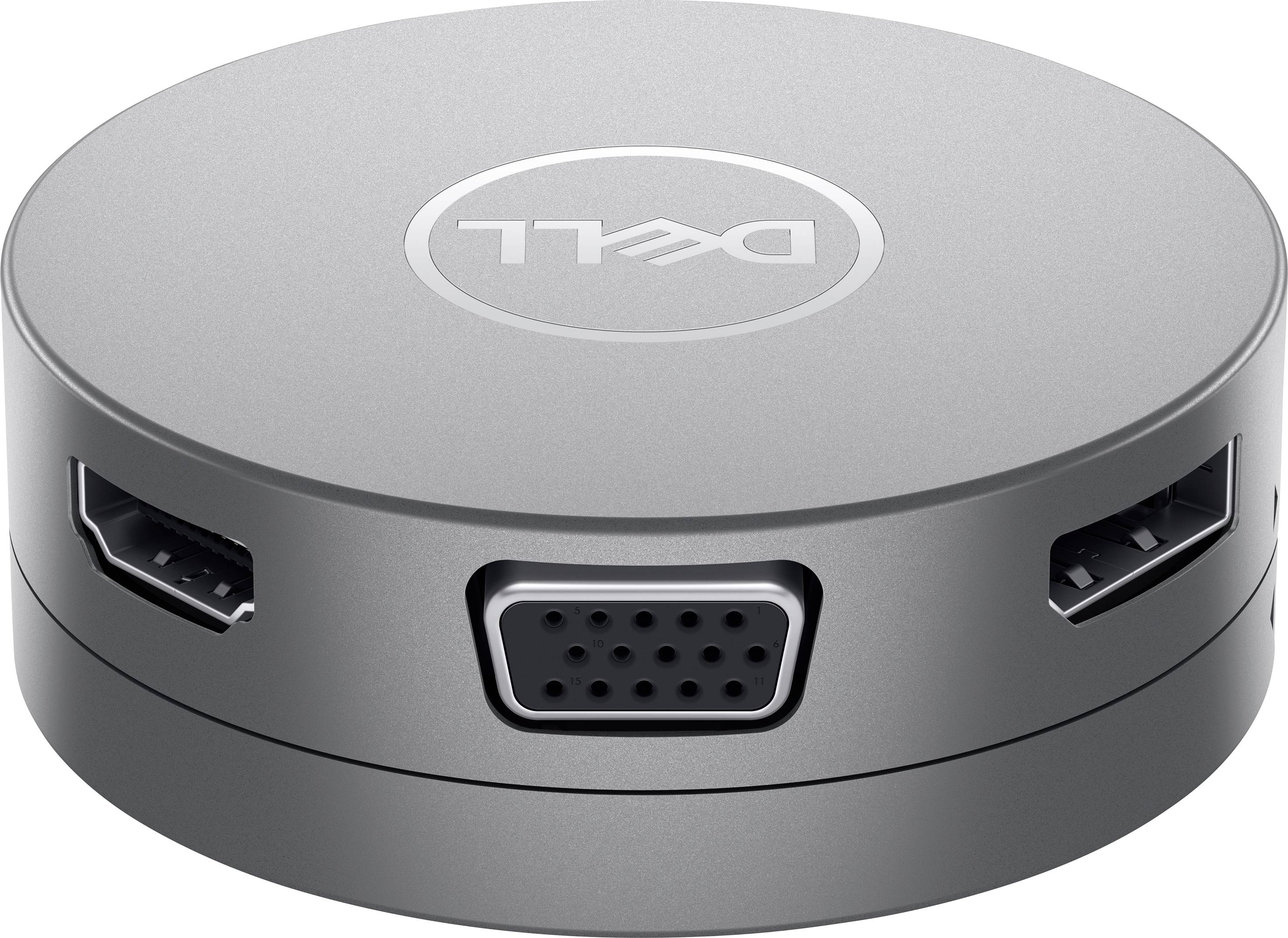 A round, silver adapter with the logo of a well-known company, featuring connections for HDMI, VGA and additional HDMI options.