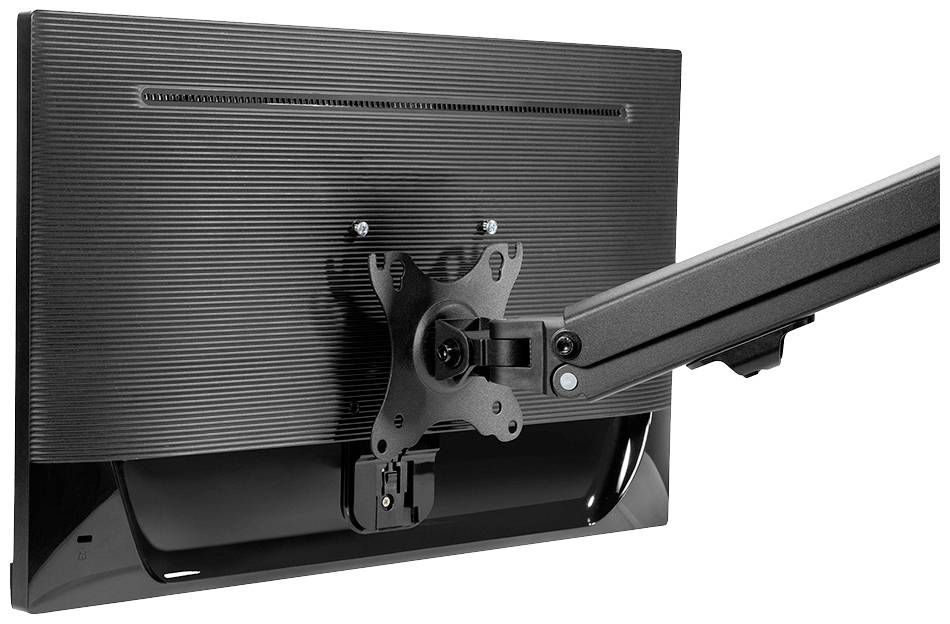 A computer monitor is mounted on an adjustable swing arm, offering flexibility in positioning.