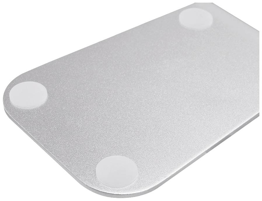 A silver rectangular device with rounded corners and four round, white feet at each corner, possibly the underside of a device.