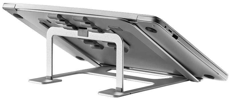 A silver laptop stand holds a laptop at a slightly tilted angle. The stand features a minimalist design.