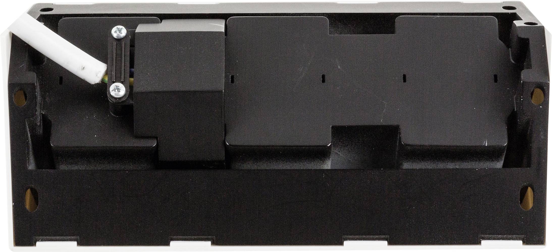 A rectangular black device with a cable at the top left, secured with a small mounting bracket. It appears to be a technical component.