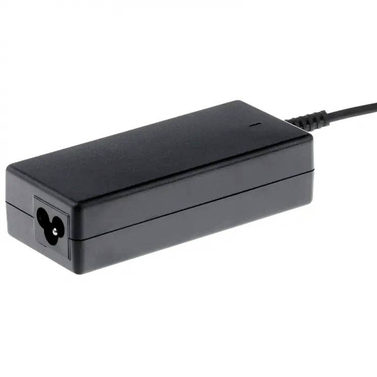 Black laptop power adapter with three-pin connector; rectangular housing and attached cable for power supply.