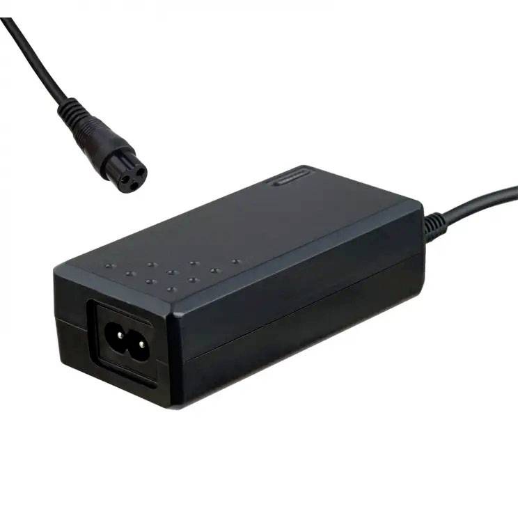 A black laptop power adapter with a detachable cable; essential for powering portable computers.