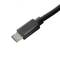 A black micro-USB cable with a flat, rectangular plug, suitable for charging or data transfer.